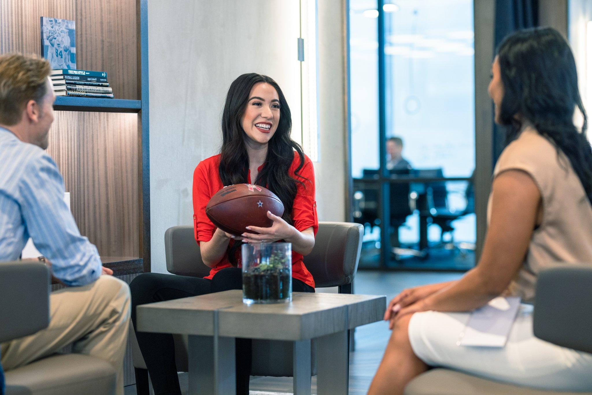 Lady holding football