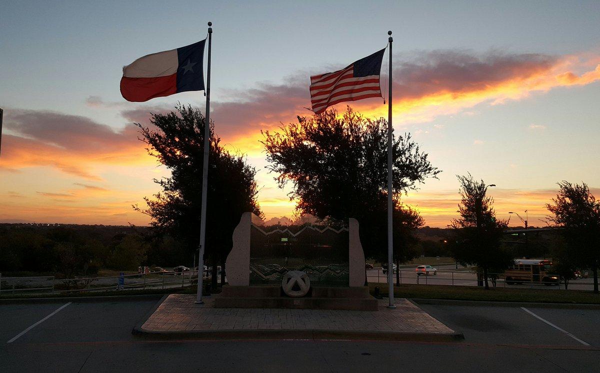 2 Flag poles with 2 different flags