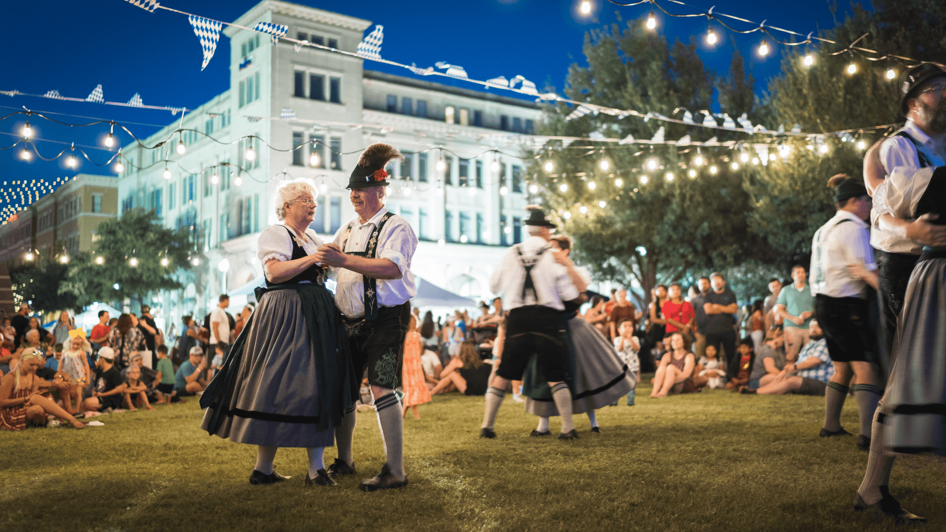 A man and a woman dancing during Oktoberfest