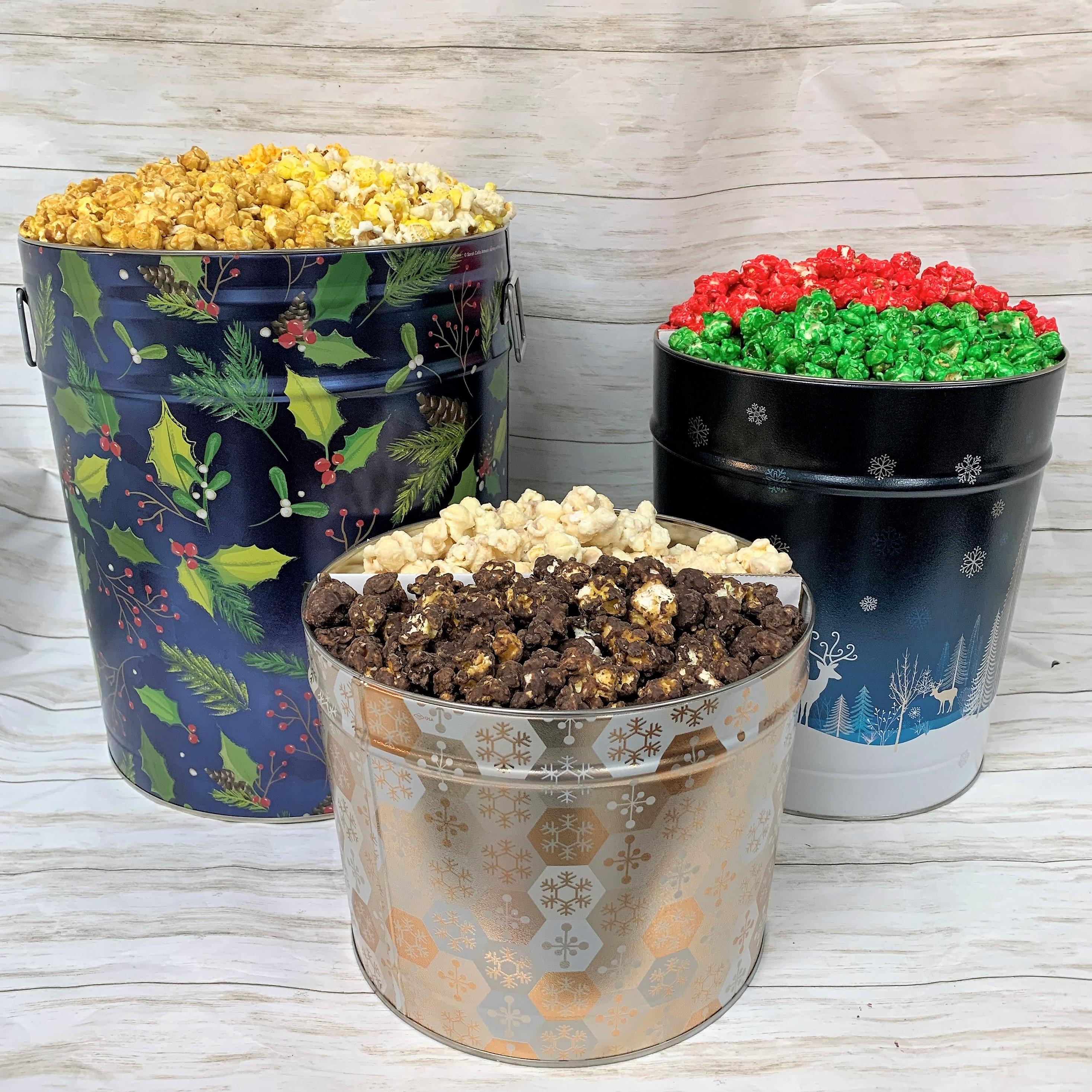 Assortment of popcorn in Christmas decorated containers