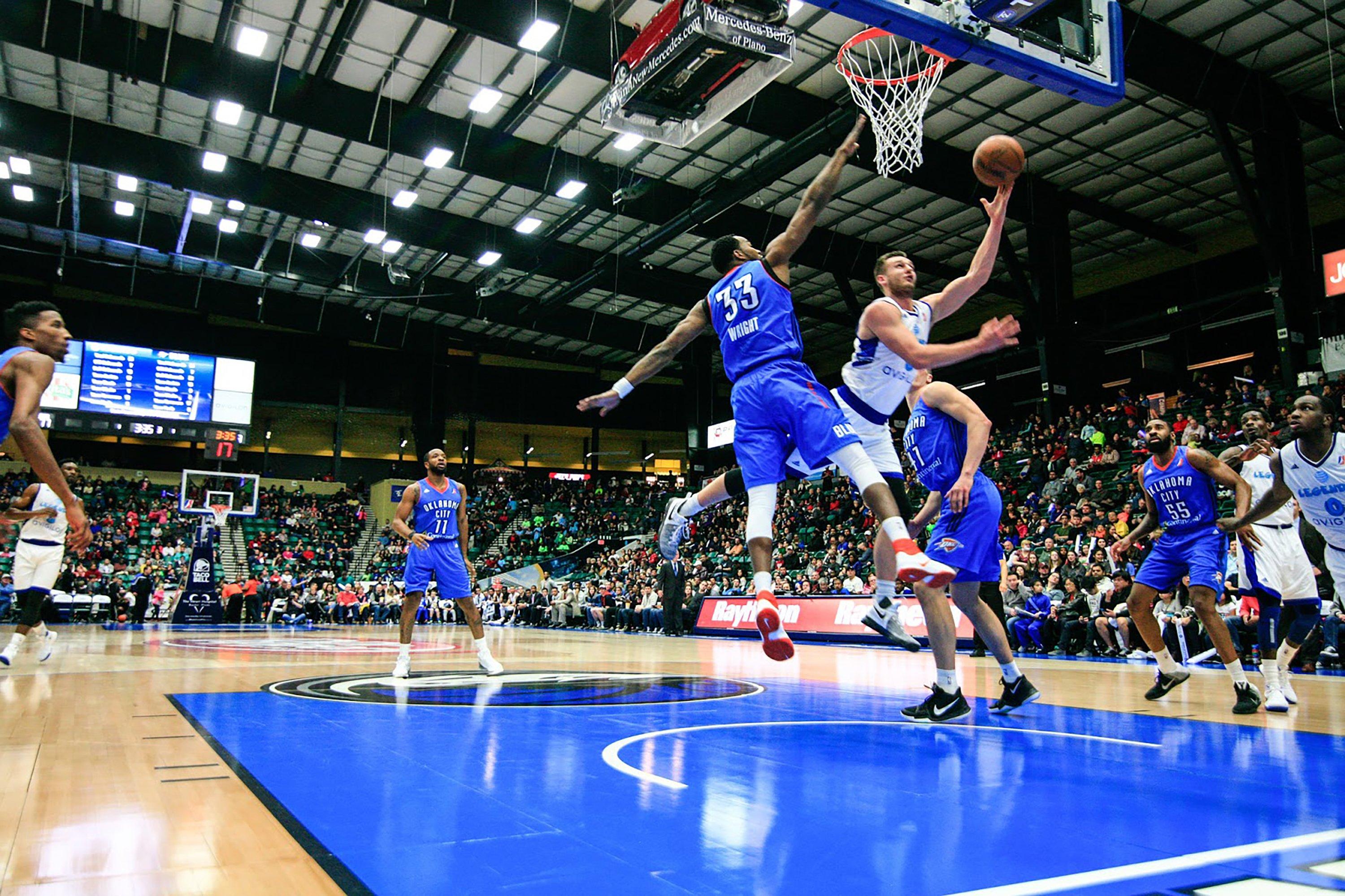 Basketball players playing basketball 