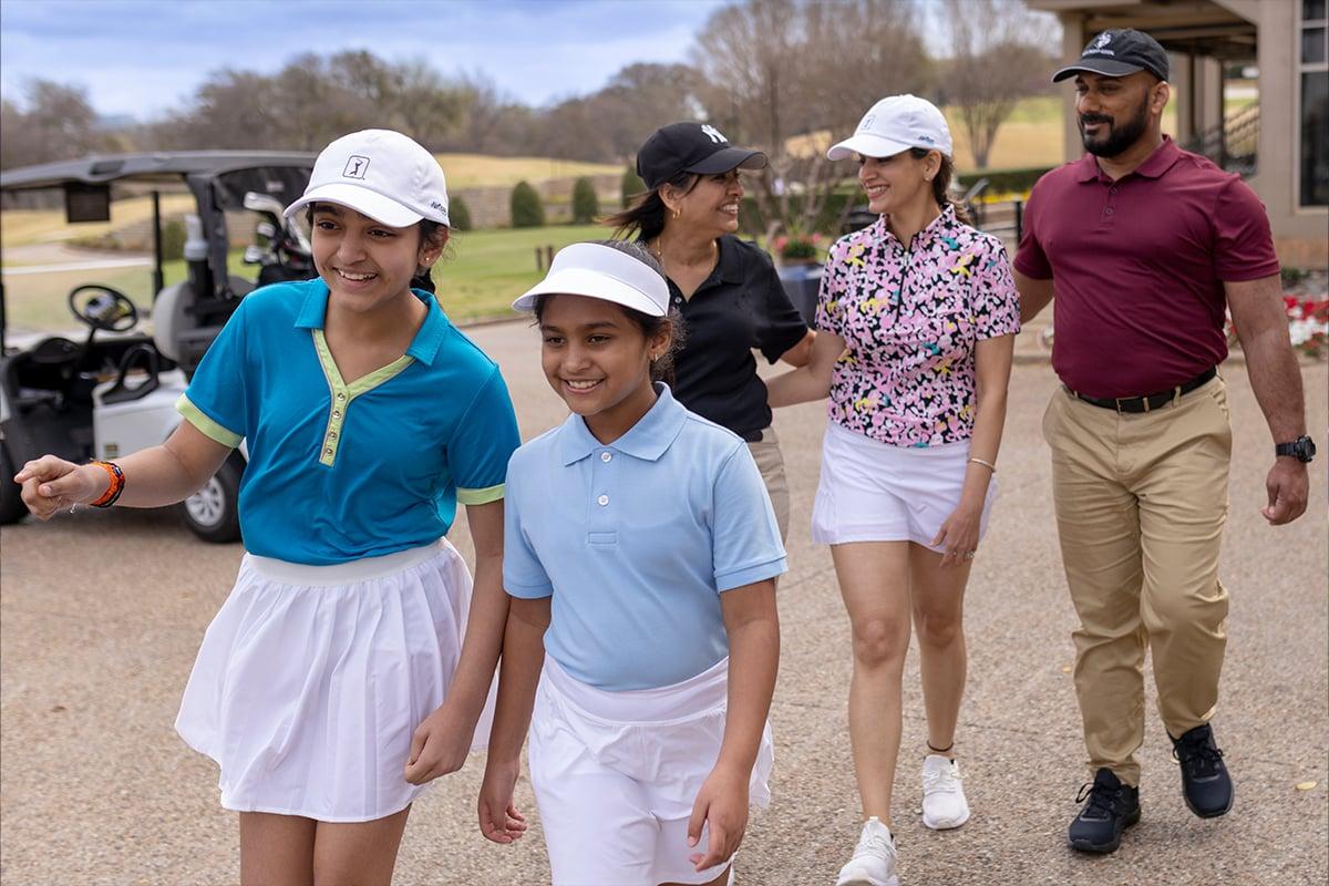 A family preparing to golf