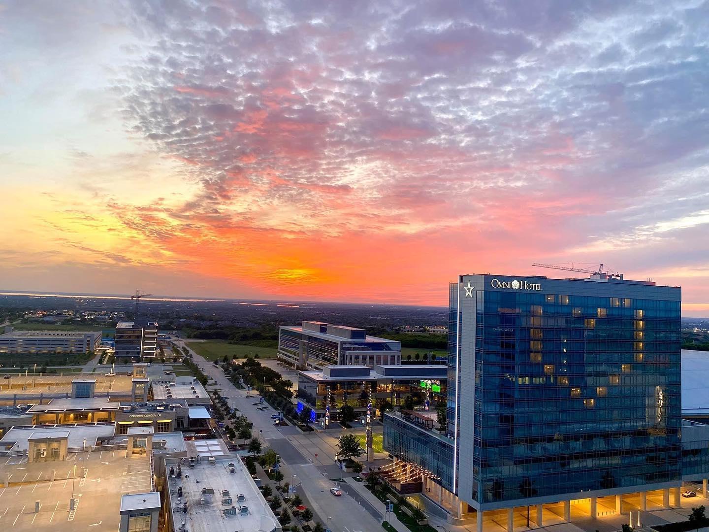 the Omni hotel with their lights on in the shape of a heart