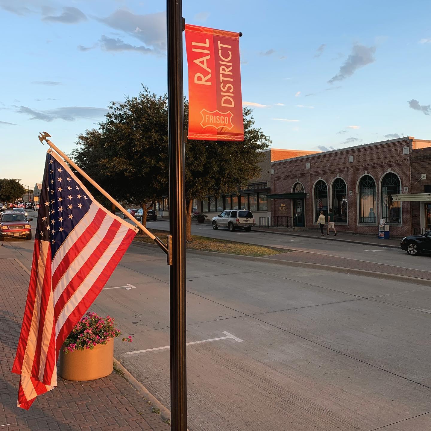 The Rail District street with an American Flag hanging from a street pole